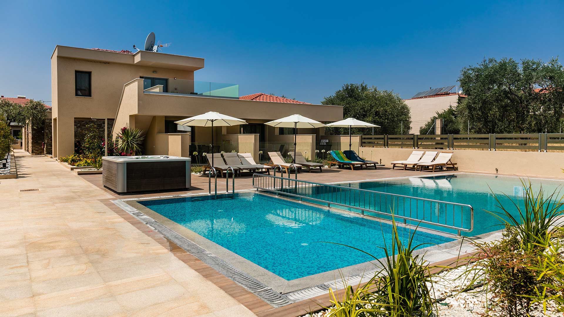 Notos Deluxe suites for an upgraded stay with a pool! 1